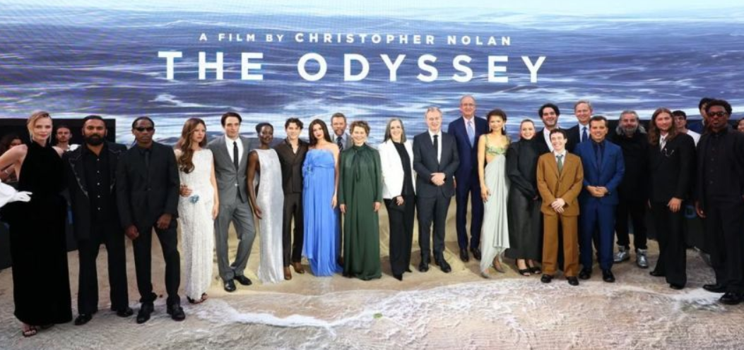 Nolan with the cast in London