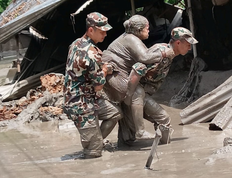 Rescuing the injured & the stranded elderly lady.